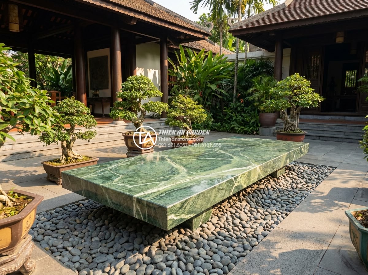 Bàn Trà Đá Nguyên Khối - Wide angle shot of a natural stone tea table in a luxury Vietnamese villa courty