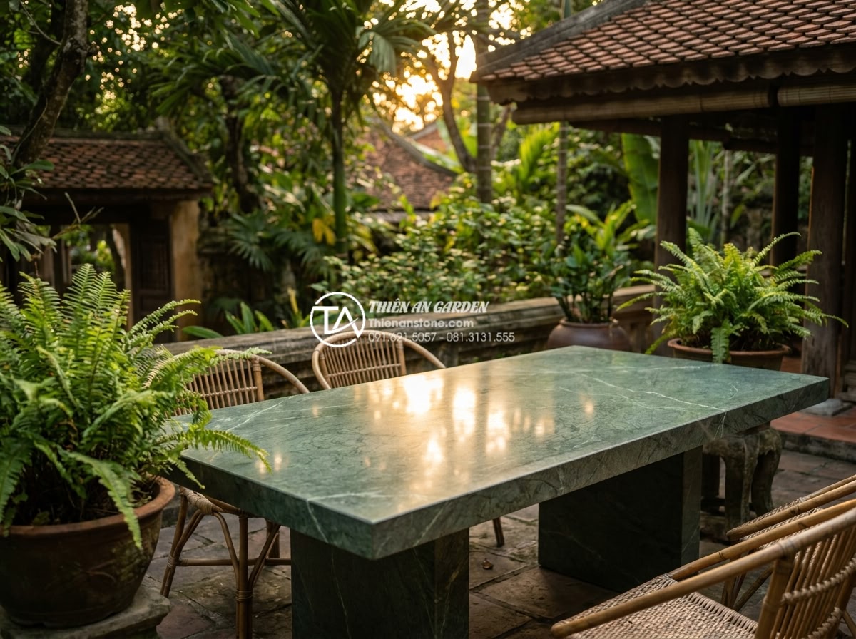 Bàn Trà Đá Nguyên Khối - Elegant jade green solid stone tea table with white veining patterns, placed on 