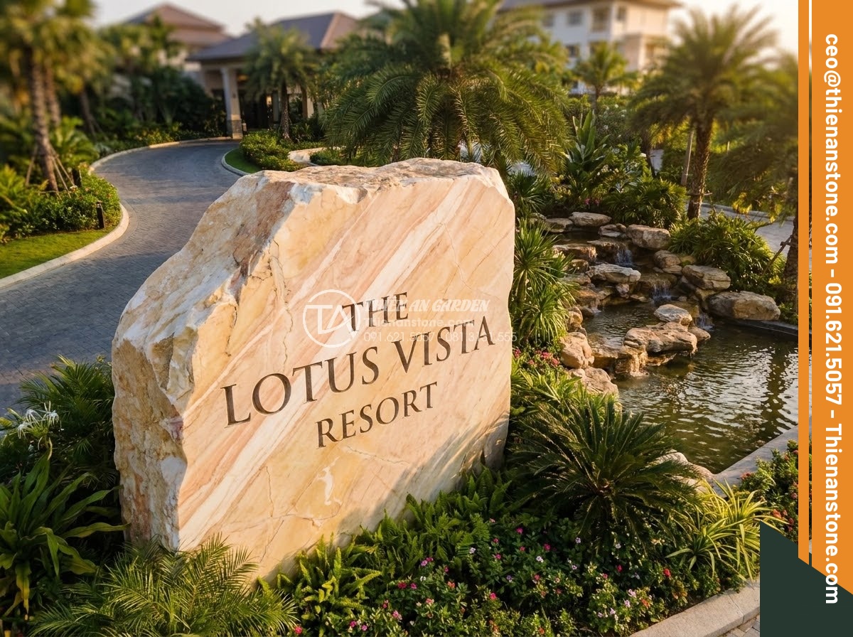 Bảng Hiệu Đá Tự Nhiên - Grand natural stone sign at five-star resort entrance, massive boulder with poli