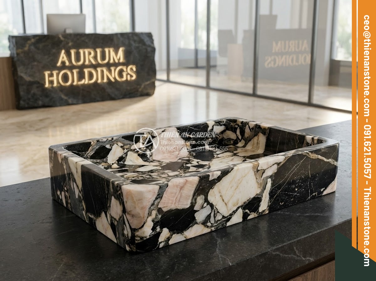Bảng Hiệu Đá Tự Nhiên - Corporate natural stone sign at modern office building lobby, black granite with