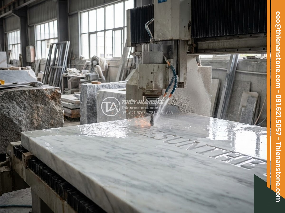Bảng Hiệu Đá Tự Nhiên - CNC machine carving precise letters into large granite slab in stone workshop, s