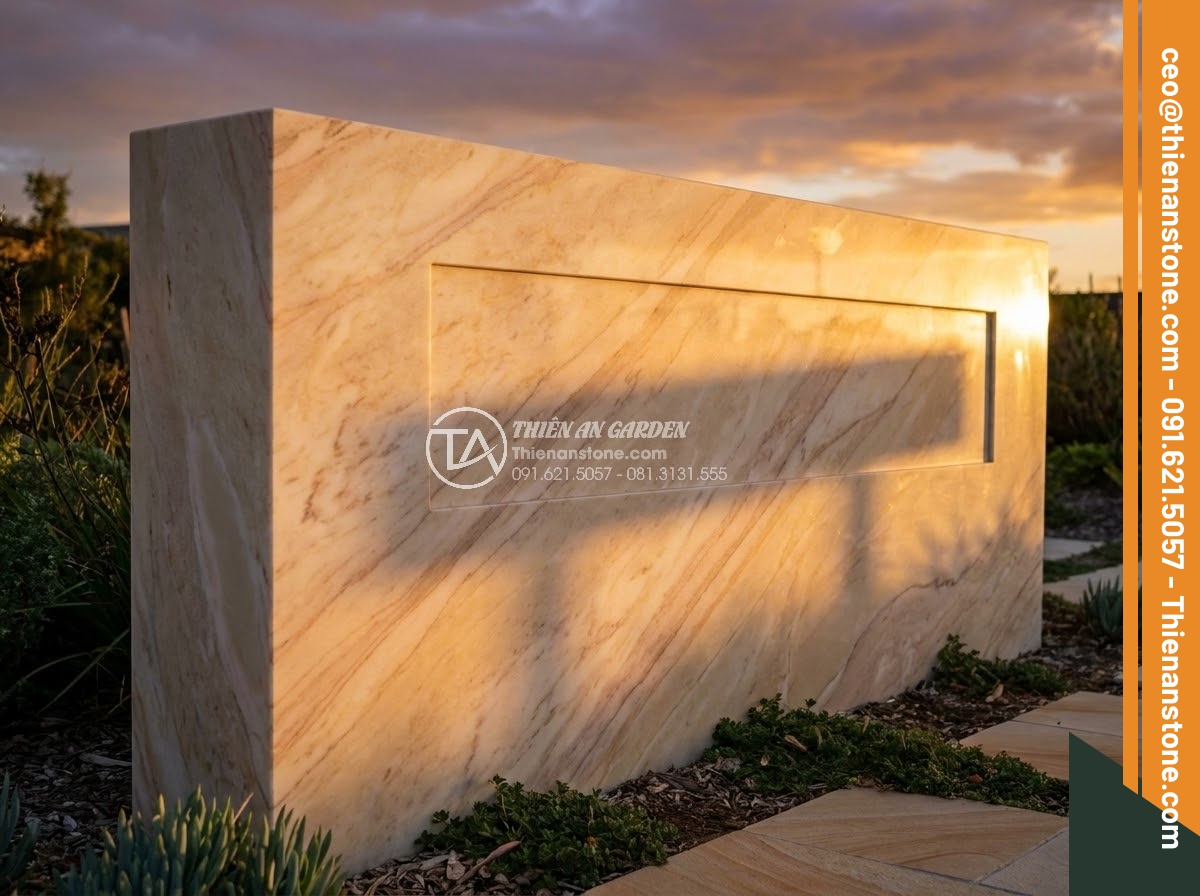 Bảng Hiệu Đá Tự Nhiên - Same natural stone sign viewed during golden hour sunset, warm amber tones refle