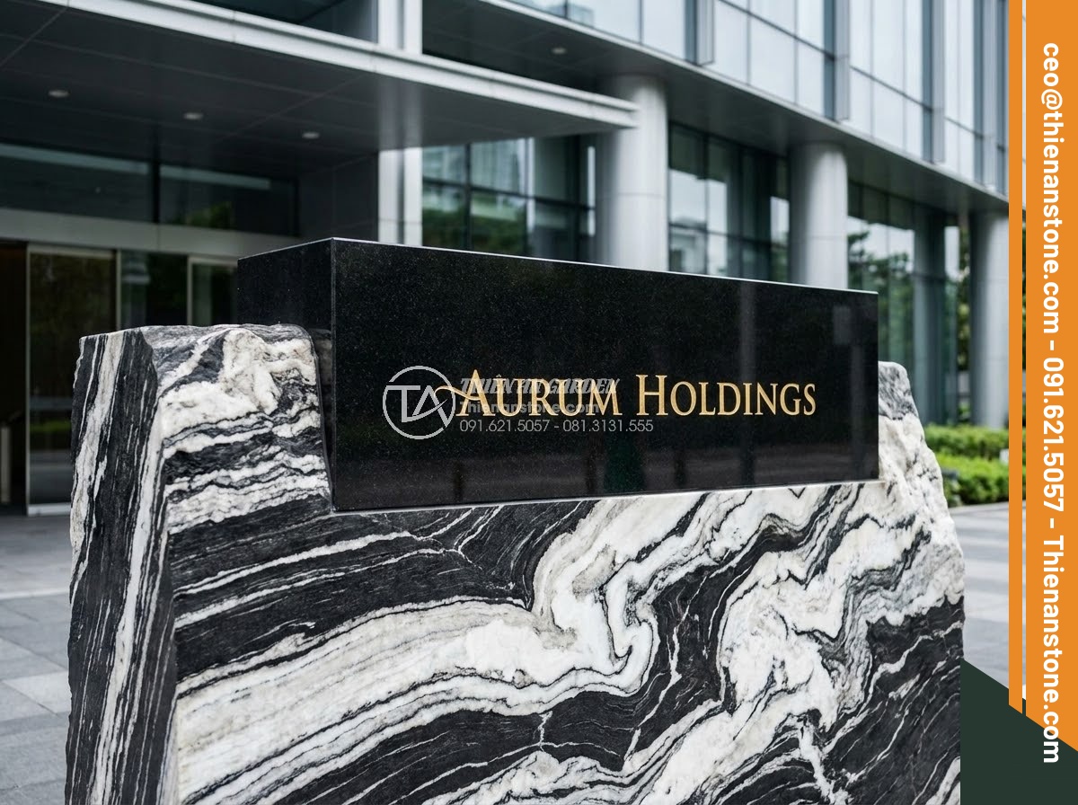 Bảng Hiệu Đá Tự Nhiên - Polished black granite sign board with gold engraved corporate name, mounted on 