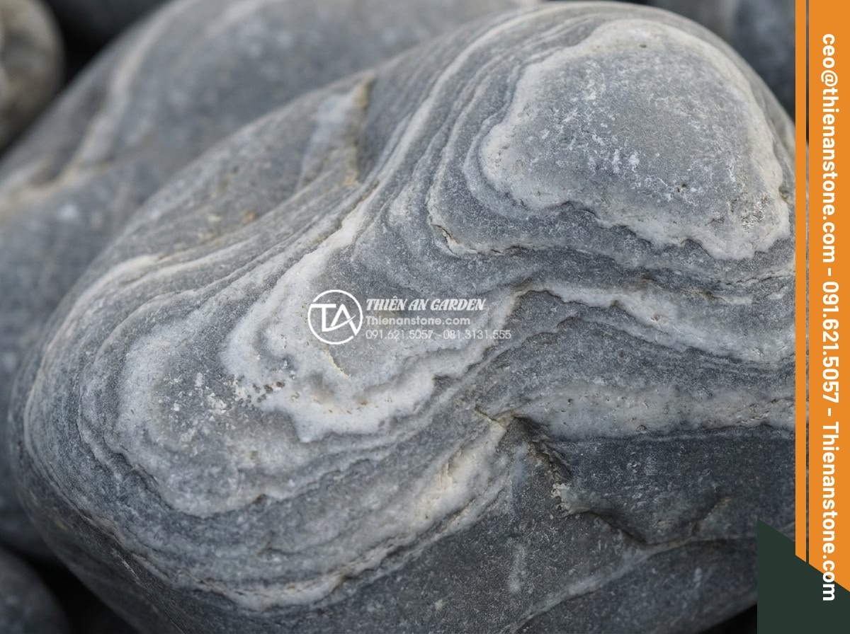 Đá Cảnh Tự Nhiên - Close-up texture of natural ornamental stone showing intricate veins and layered