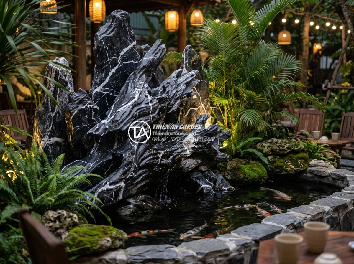 Đá Dựng Non Bộ - Hình 21 Đá Dựng Non Bộ - Natural stone rockery feature in Vietnamese garden cafe setting customers sittin