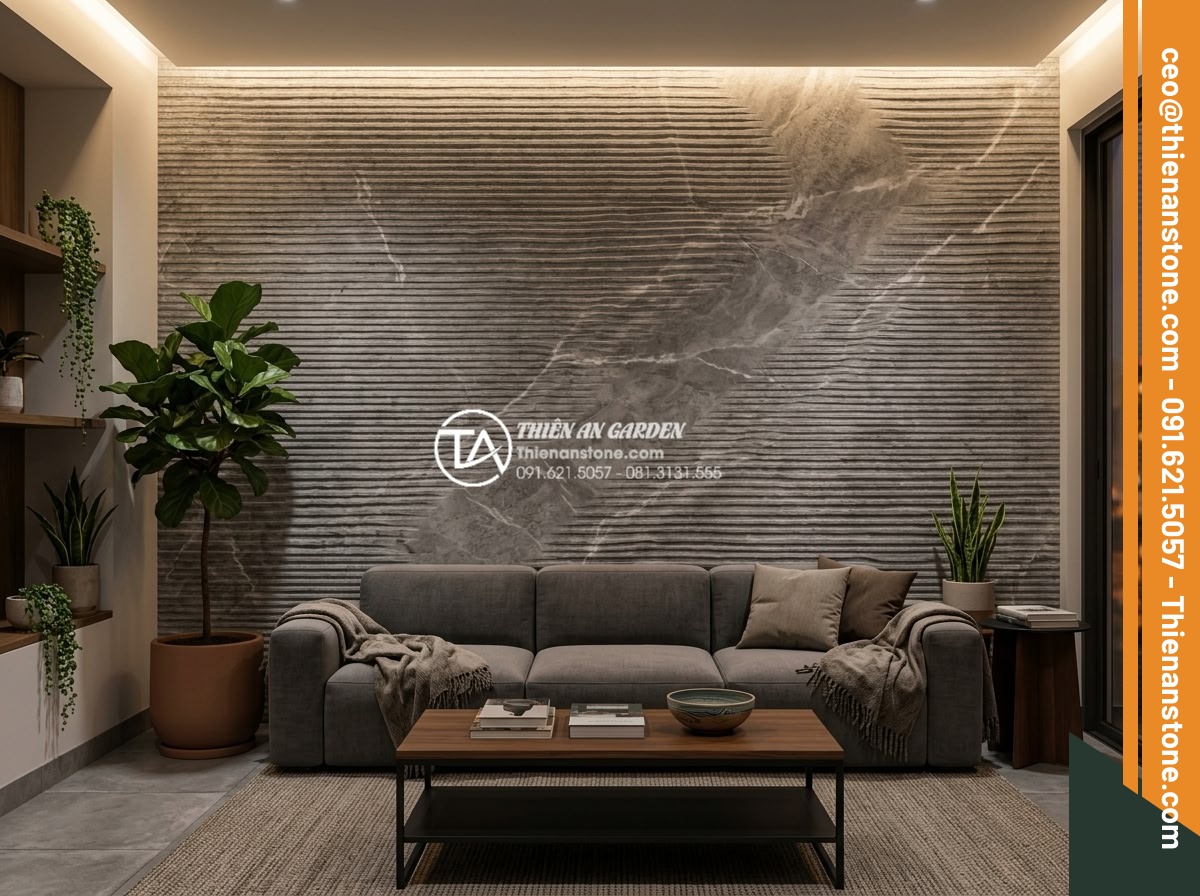 Đá Răng Lược - Hình 23 Đá Răng Lược - Natural comb stone accent wall behind modern sofa in luxury living room, indirec