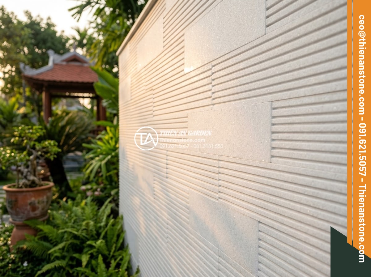 Đá Răng Lược - Hình 39 Đá Răng Lược - Completed comb stone wall cladding project being inspected by architect and home