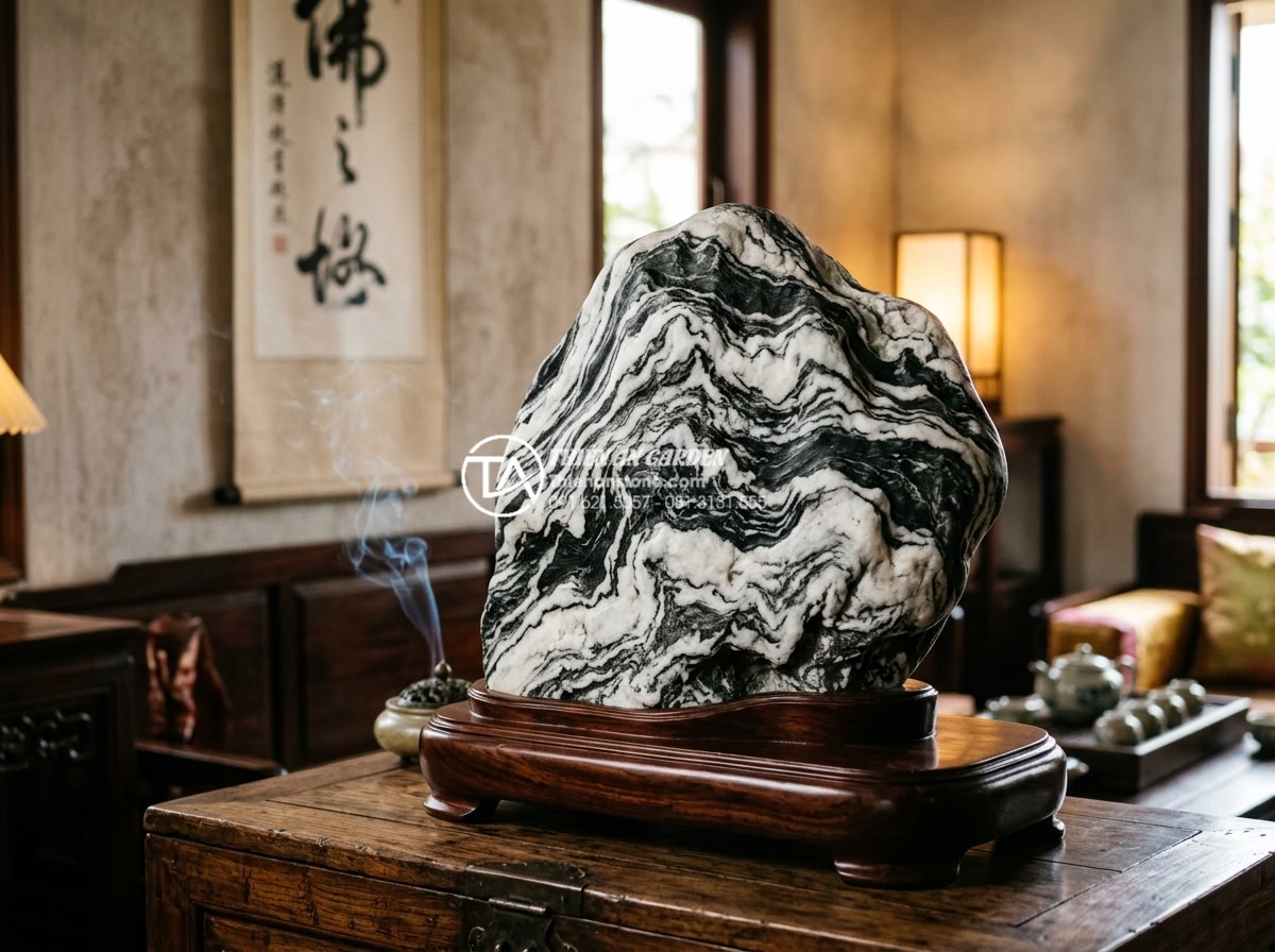 Đá Tuyết Sơn - Hình 21 Đá Tuyết Sơn - Single Tuyet Son stone on polished wooden display stand in traditional Vietnames