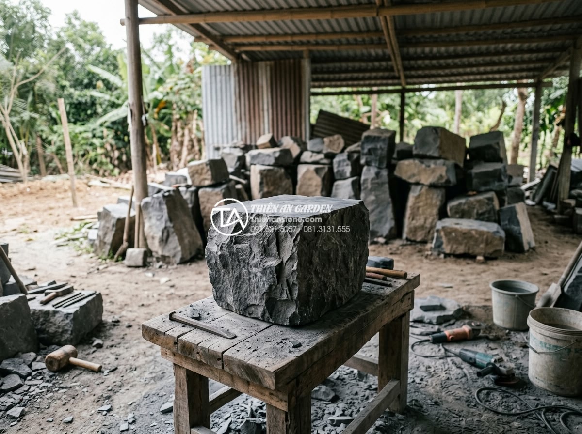 Lavabo Đá Tự Nhiên - Master stone craftsman carefully examining and selecting raw natural stone block