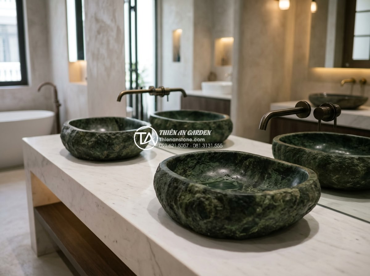 Lavabo Đá Tự Nhiên - Luxury bathroom showroom with multiple natural stone lavabo basins displayed on 