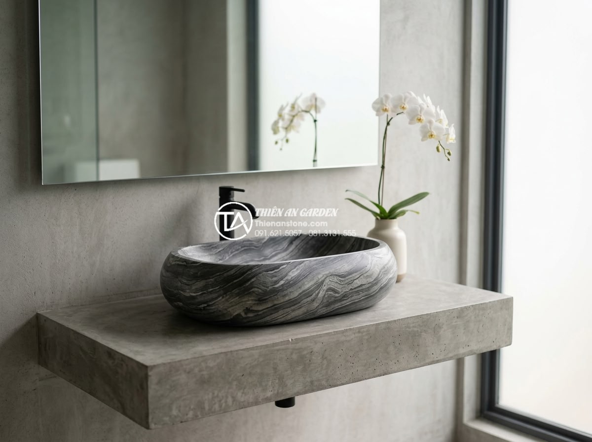 Lavabo Đá Tự Nhiên - Dark basalt stone lavabo basin with honed matte finish on floating concrete vani