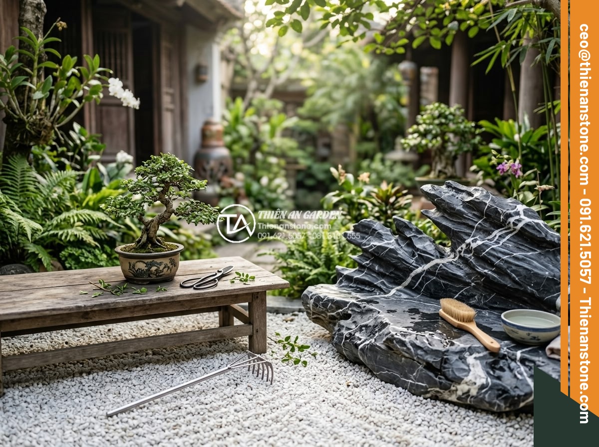 Tiểu Cảnh Góc Sân - Hình 37 Tiểu Cảnh Góc Sân - Maintenance of a corner garden - person gently raking white gravel, pruning smal