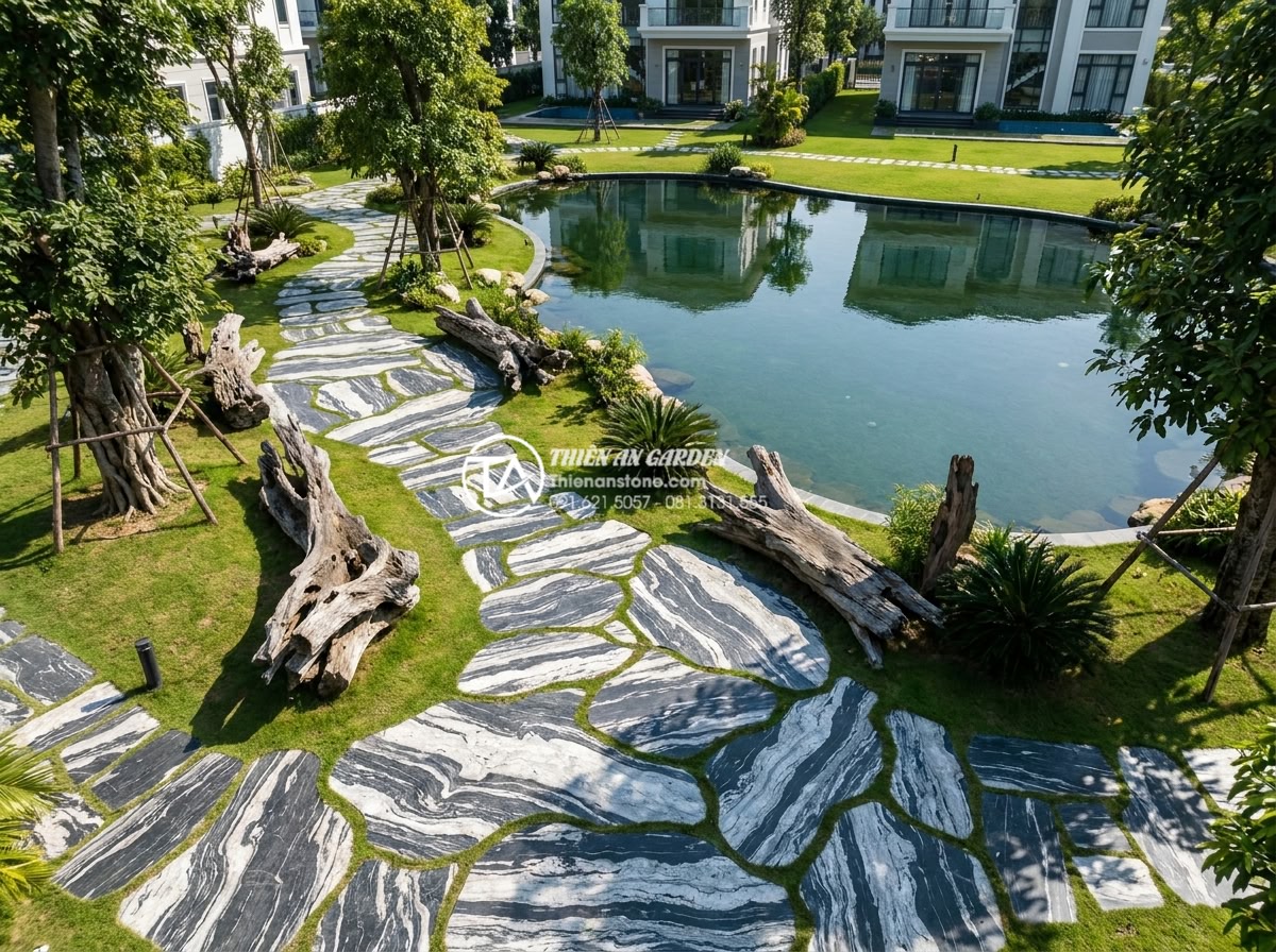 Hồ sơ năng lực: Case study dự án tiểu cảnh gỗ lũa tại Vinhomes - Aerial drone view of the completed Vinhomes villa garden project showcasing the 