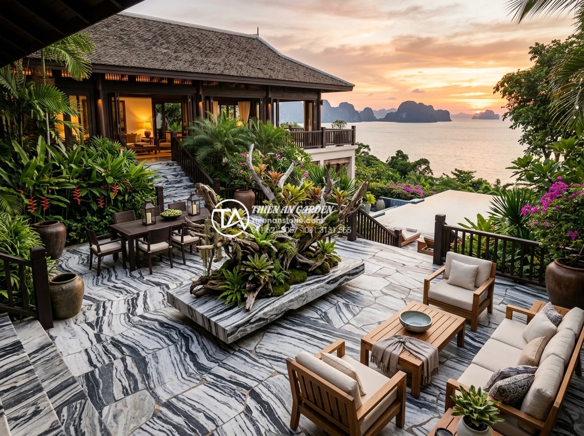 Tiểu cảnh gỗ lũa là gì? Tại sao giới thượng lưu lại ưa chuộng? - Elegant wide view of a luxury villa terrace featuring a large custom driftwood l