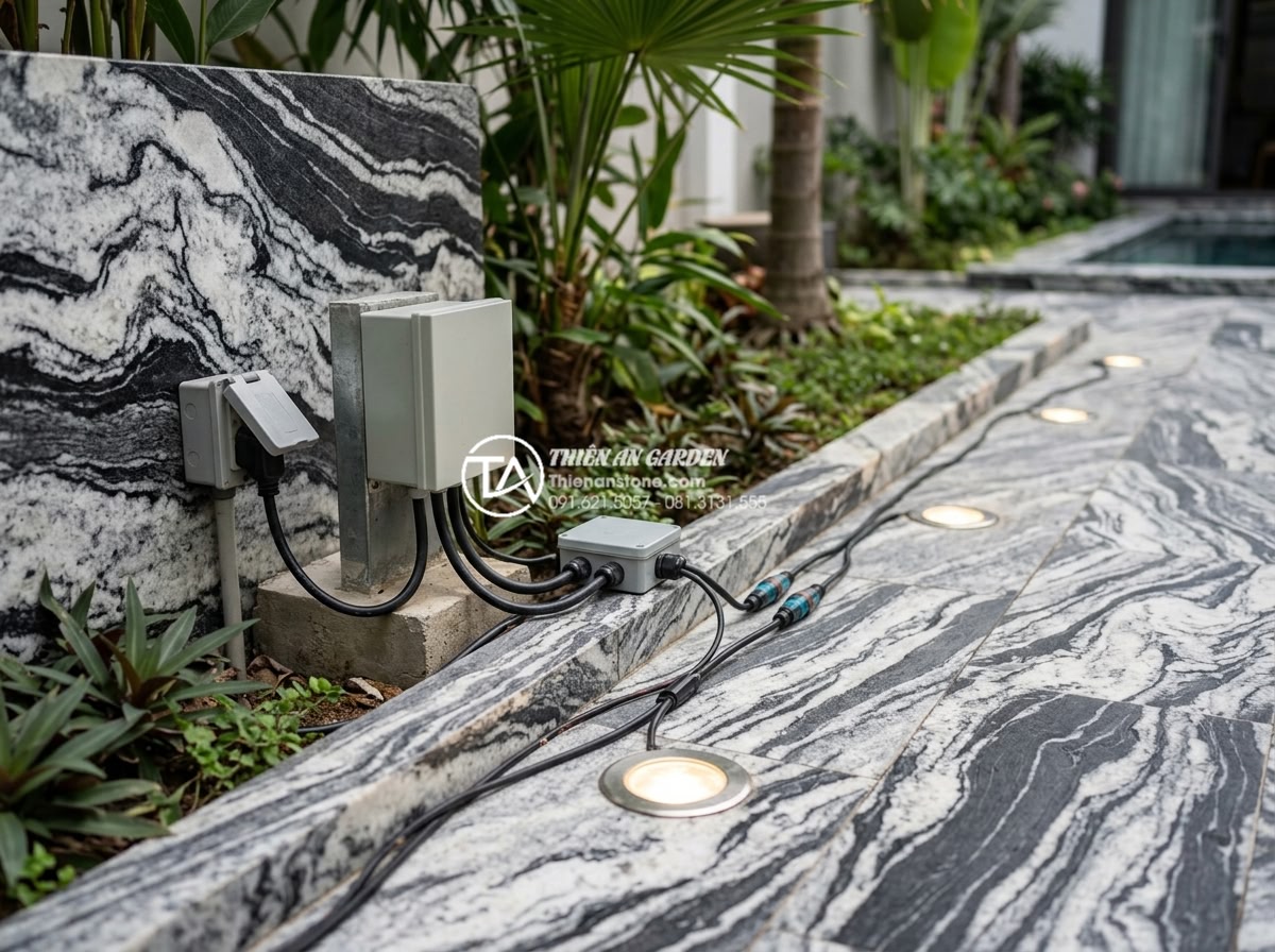 Cách lắp đặt hệ thống đèn led âm đá cho tiểu cảnh ban công lung linh về đêm - Waterproof electrical connections and transformer setup for outdoor recessed LED
