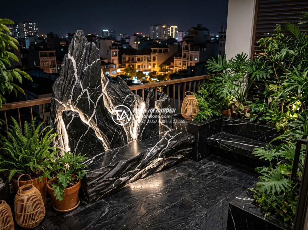Cách lắp đặt hệ thống đèn led âm đá cho tiểu cảnh ban công lung linh về đêm - Stunning nighttime balcony scene featuring illuminated natural stone features wi