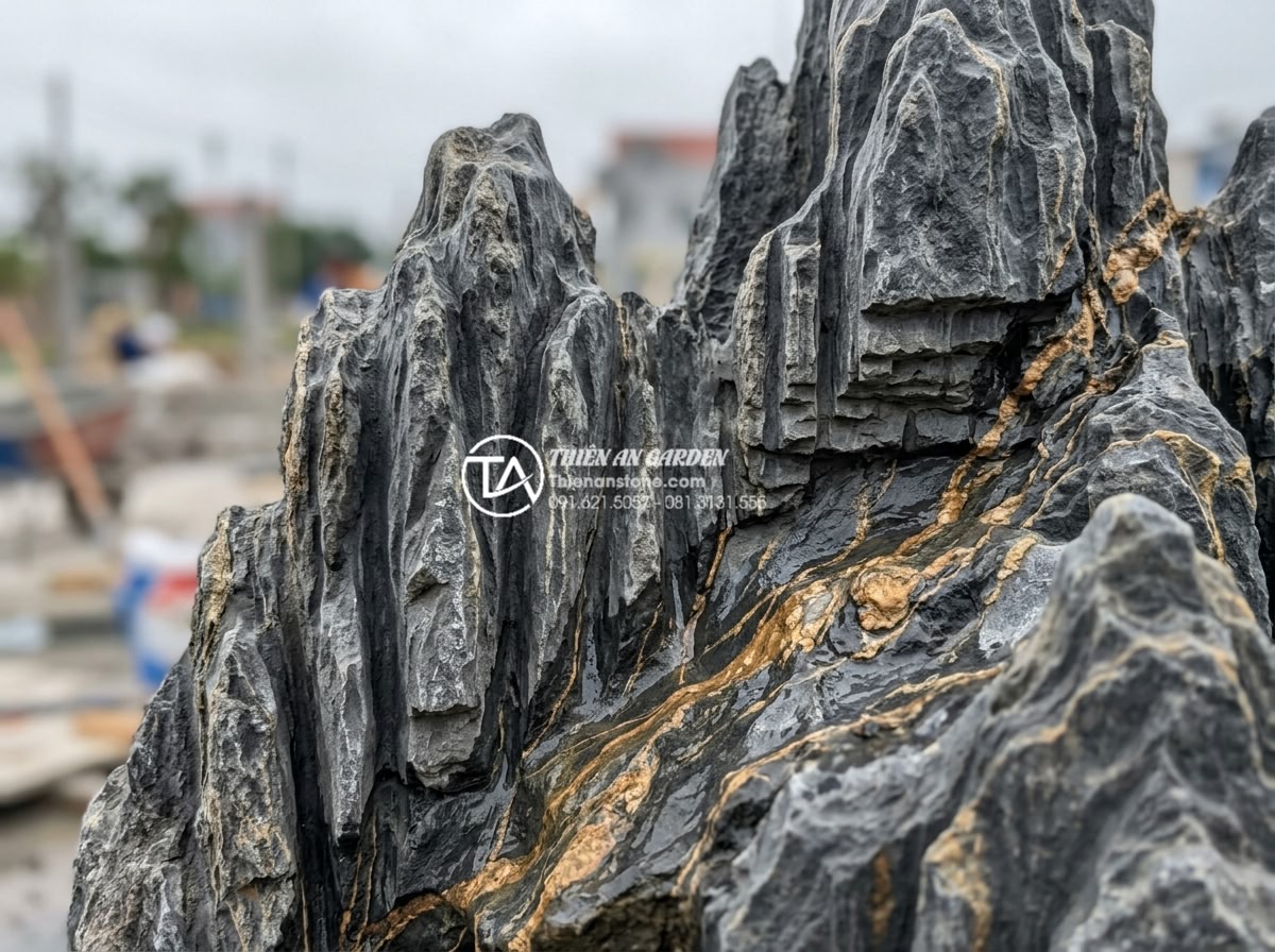 Case Study: Biến gầm cầu thang cũ kỹ thành hồ cá Koi mini đẳng cấp tại Hà Nội - Close-up professional shot of premium natural stone materials used in Koi pond c