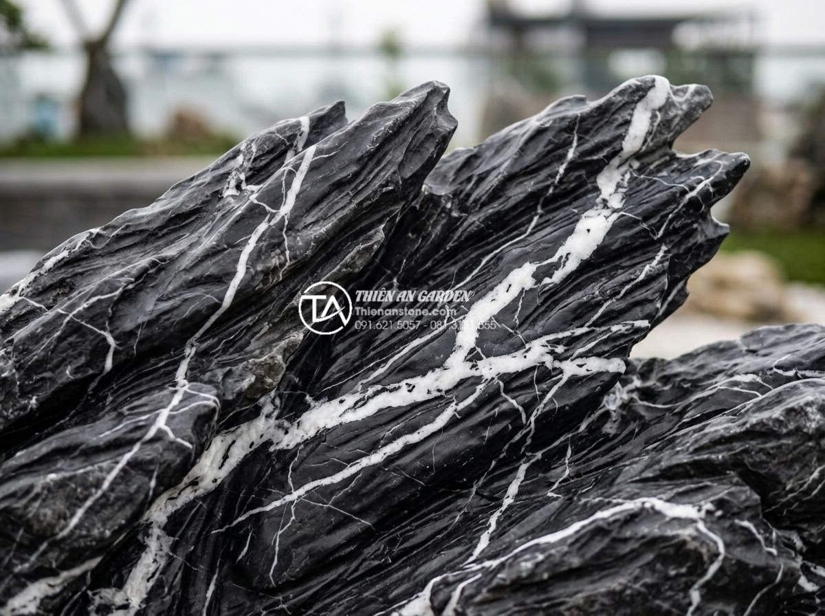 Case Study: Cải tạo sân thượng 15m2 thành không gian thư giãn kiểu Nhật - High resolution detail of premium natural stones used in the Japanese rooftop ga