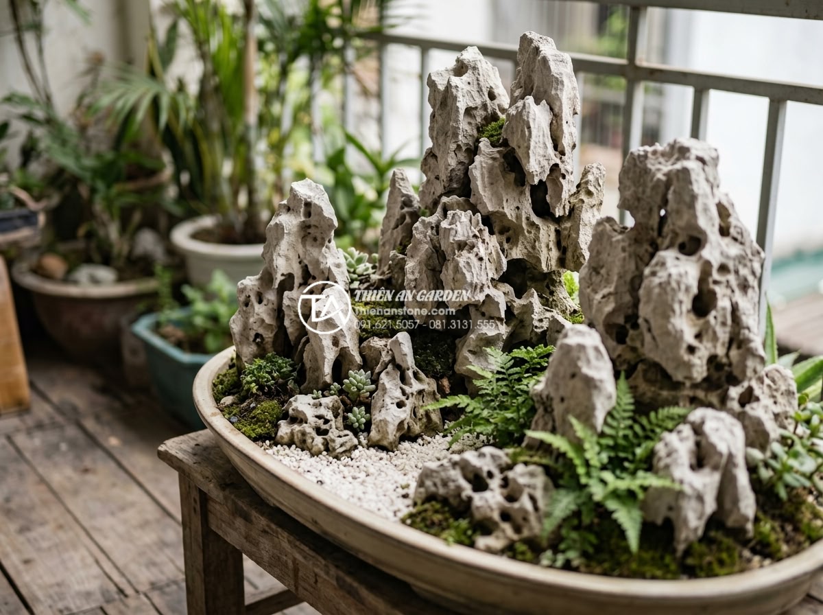 Checklist 10 bước thi công tiểu cảnh ban công chuyên nghiệp cho người mới - Expert arrangement of various natural stone pieces forming artistic rock formati