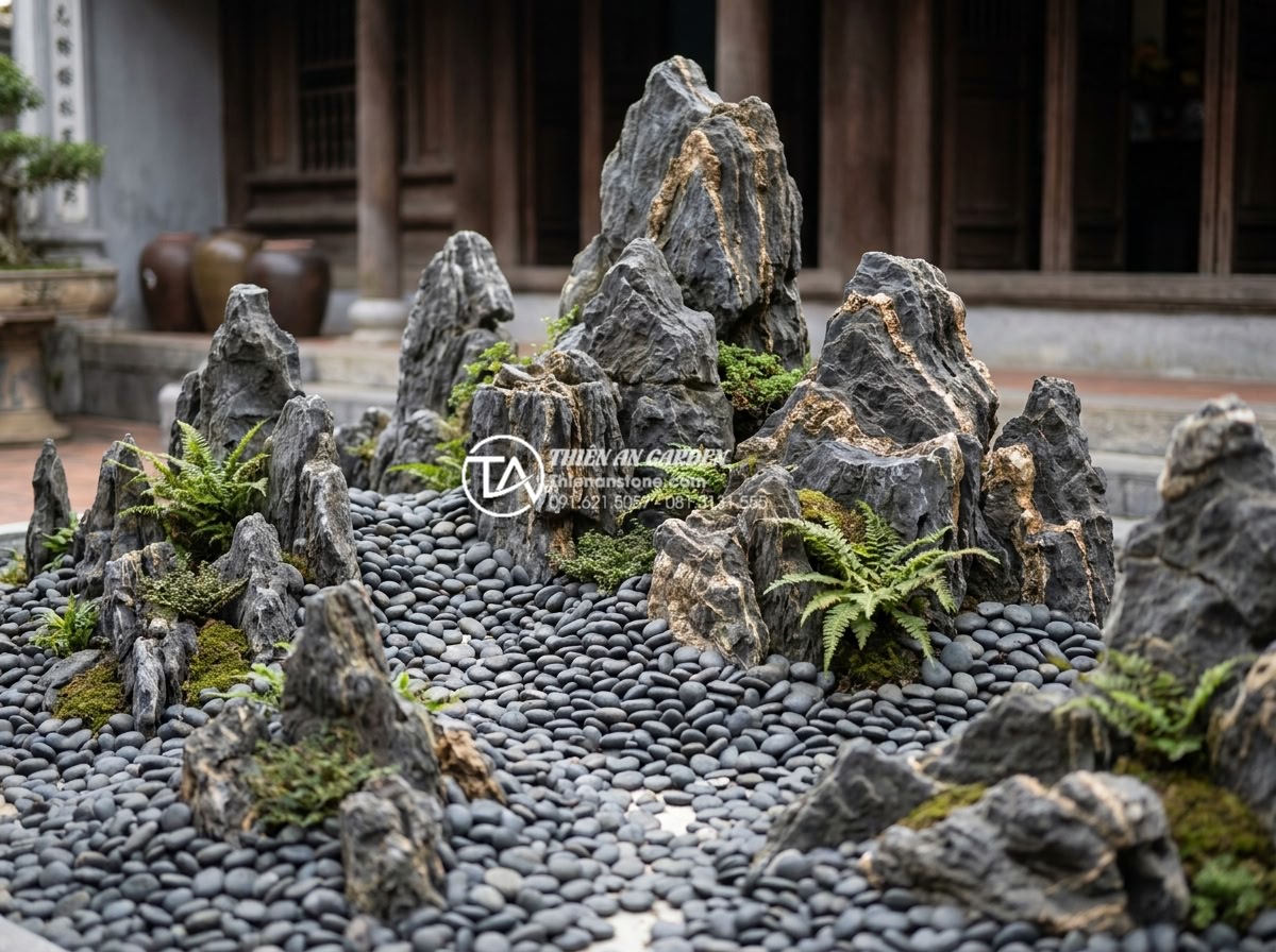 Hướng dẫn 7 bước tự làm tiểu cảnh sân thượng đá cuội cho người mới - Hình 18 Hướng dẫn 7 bước tự làm tiểu cảnh sân thượng đá cuội cho người mới - Finished rock arrangement creating hills, valleys, and pathways in pebble garden