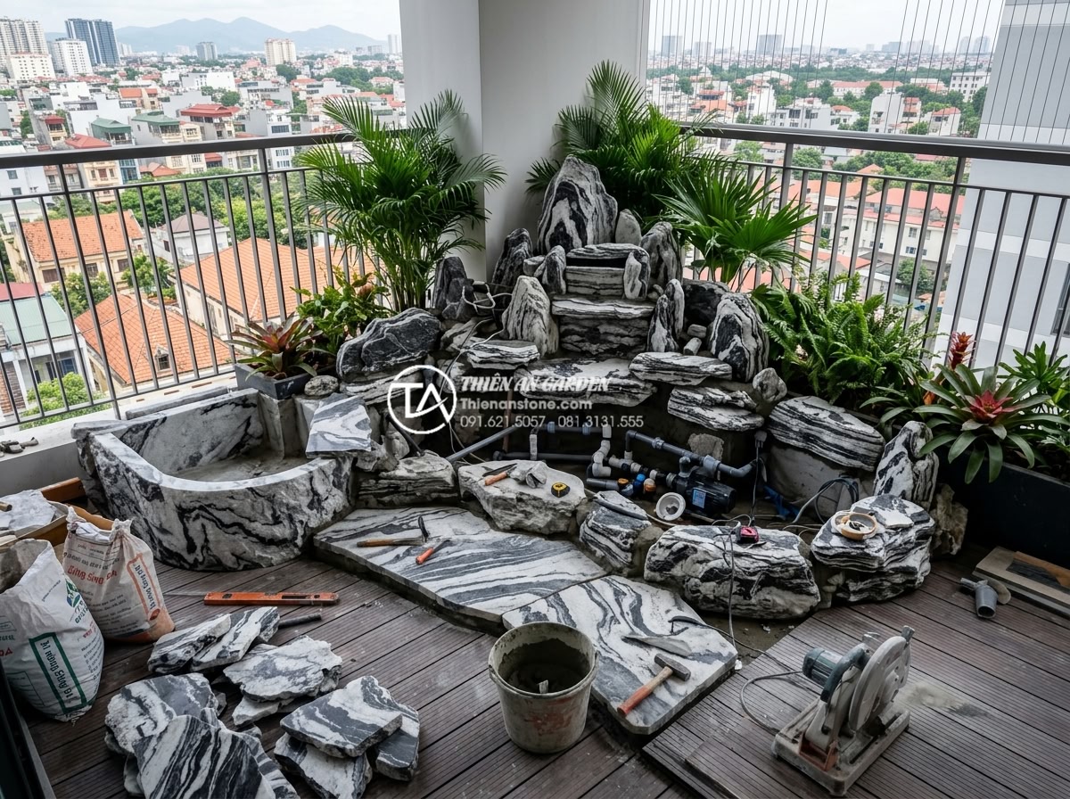 Nghệ thuật sử dụng đá Tuyết Sơn trong tiểu cảnh ban công cao cấp - Professional team installing Snow Mountain stones in luxury balcony garden with 