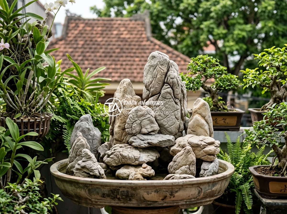 Review 10 đơn vị thiết kế thi công tiểu cảnh ban công uy tín nhất hiện nay - Branding image of Da Canh Thien An company showcasing their stone craftsmanship 