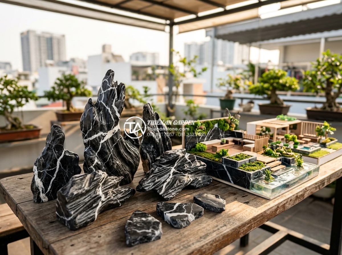Review 5 đơn vị thi công tiểu cảnh sân thượng uy tín tại Hà Nội và TP.HCM - Practical advice scene with client inspecting natural stone samples and garden d