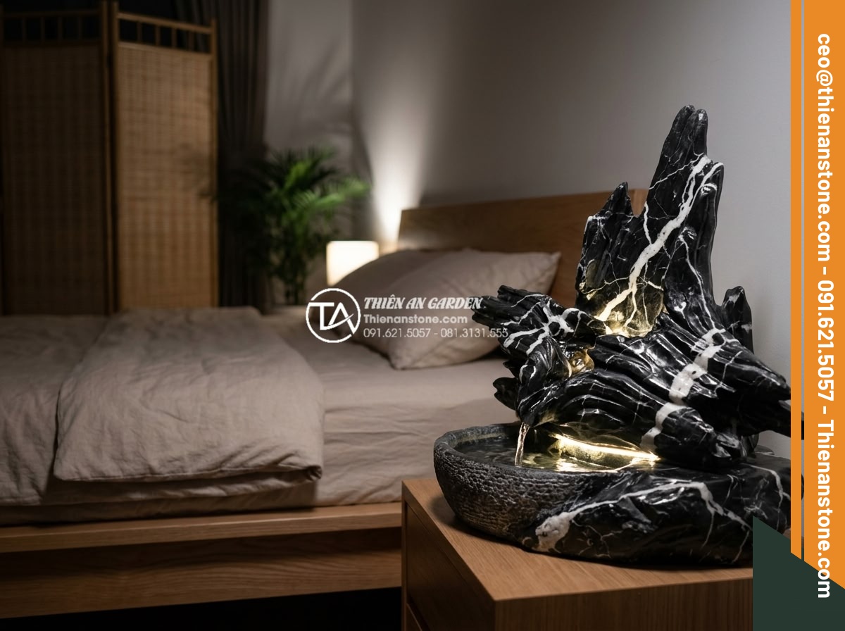 Tác dụng của tiểu cảnh đá tự nhiên trong việc điều hòa ion âm cho không gian nhà - Calm nighttime bedroom interior with compact natural stone mini landscape placed
