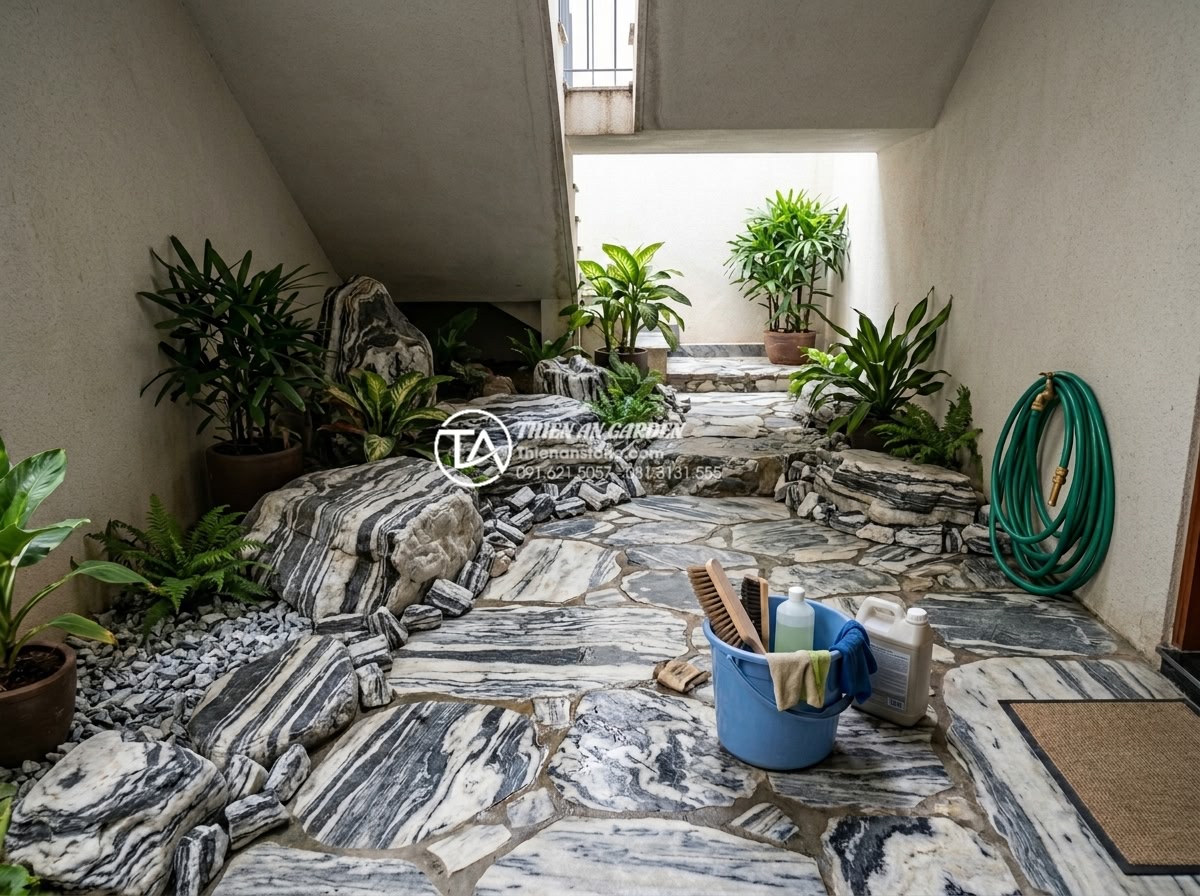 Top 5 loại đá tự nhiên trang trí tiểu cảnh gầm cầu thang đẹp nhất - Maintenance tips visual for natural stone under-stair landscape including cleani