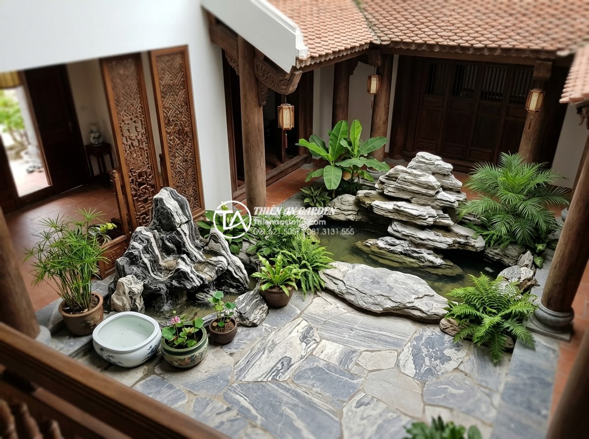 Tư vấn vị trí đặt tiểu cảnh giếng trời trước nhà và giữa nhà chuẩn phong thủy - Hình 5 Tư vấn vị trí đặt tiểu cảnh giếng trời trước nhà và giữa nhà chuẩn phong thủy - Feng Shui diagram illustration showing natural stone placement in sky well posit