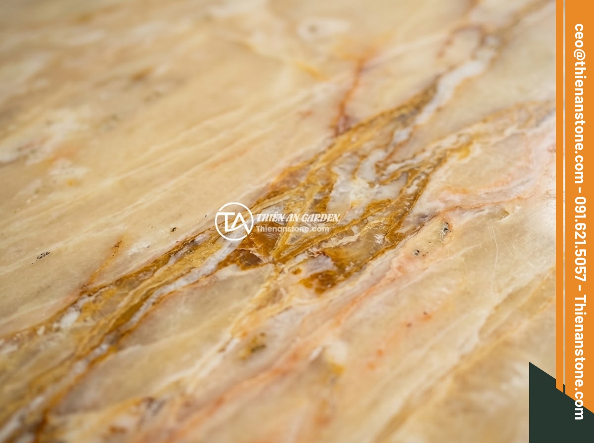 Bảng hiệu đá vàng cẩm thạch - Hình 2 Bảng hiệu đá vàng cẩm thạch - Close-up macro shot of yellow jade marble surface showing intricate natural vein