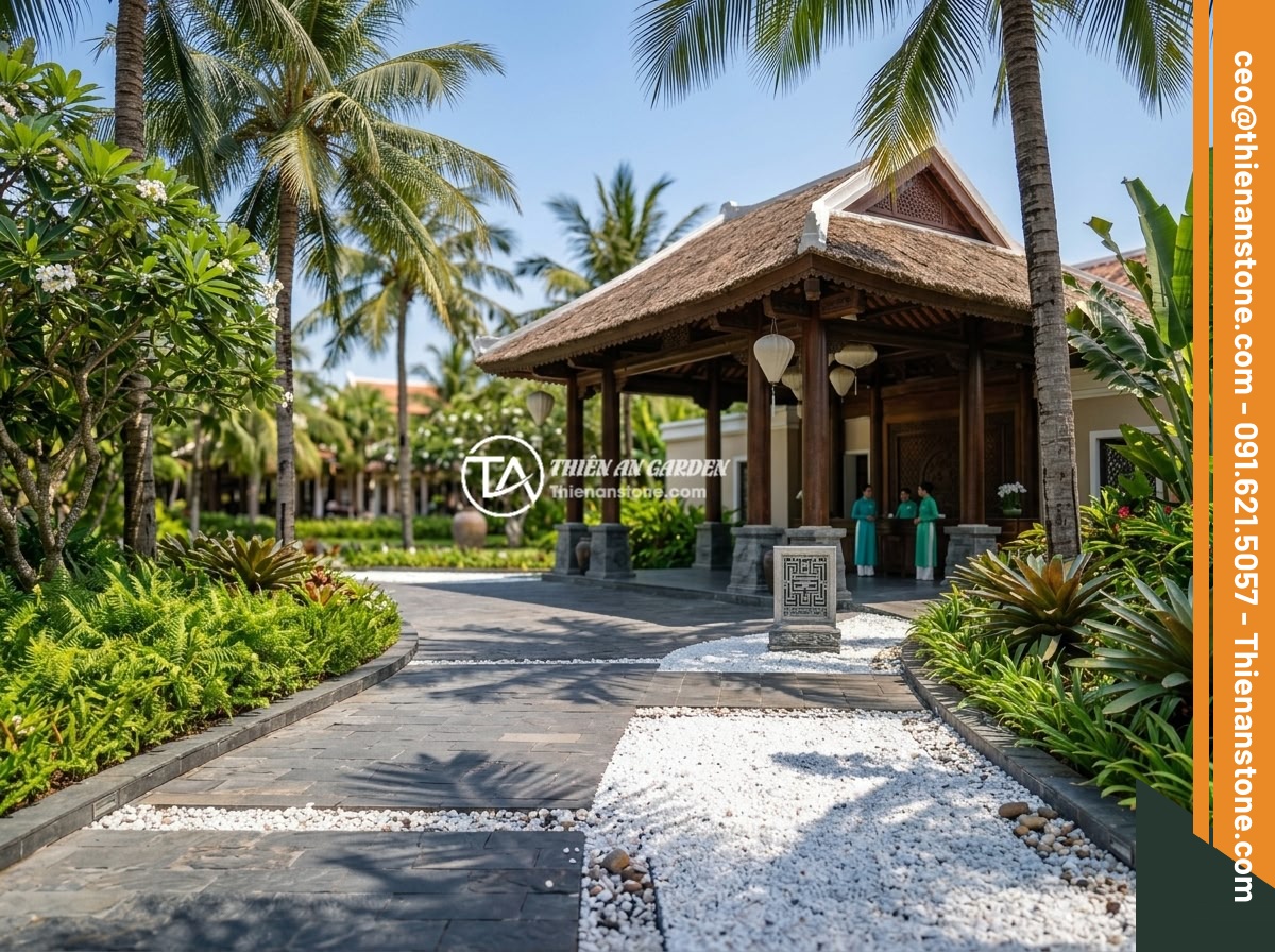 Đá thạch anh vụn trắng - Hình 11 Đá thạch anh vụn trắng - A luxurious five-star resort entrance in Vietnam featuring wide pathways with wh