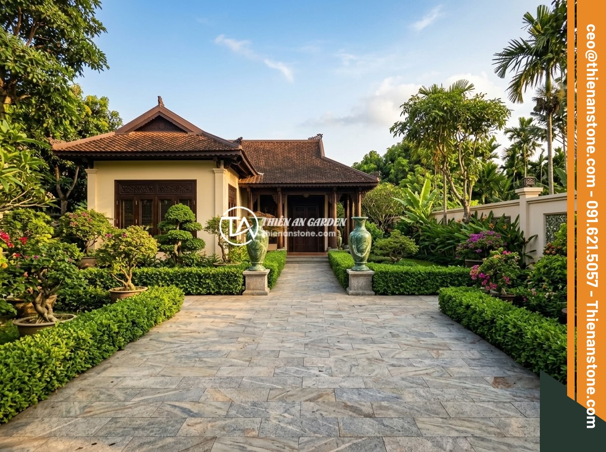 Lục bình đá xanh Ấn Độ - Hình 2 Lục bình đá xanh Ấn Độ - Wide angle view of a Vietnamese luxury villa entrance featuring twin Indian gree