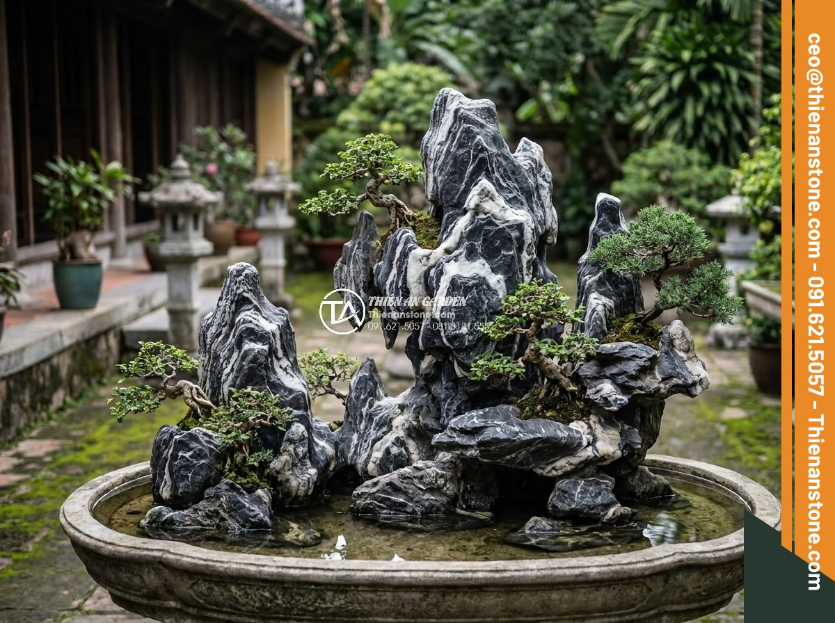 Hòn Non Bộ Đá Tuyết Sơn: Vẻ Đẹp Đẳng Cấp Cho Biệt Thự Sân Vườn - Traditional style Tuyet Son stone hòn non bộ design with multiple layered peaks 