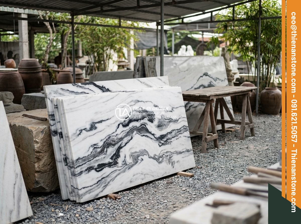 Hòn Non Bộ Đá Tuyết Sơn: Vẻ Đẹp Đẳng Cấp Cho Biệt Thự Sân Vườn - Professional quality inspection of Tuyet Son stone slabs showing perfect white b