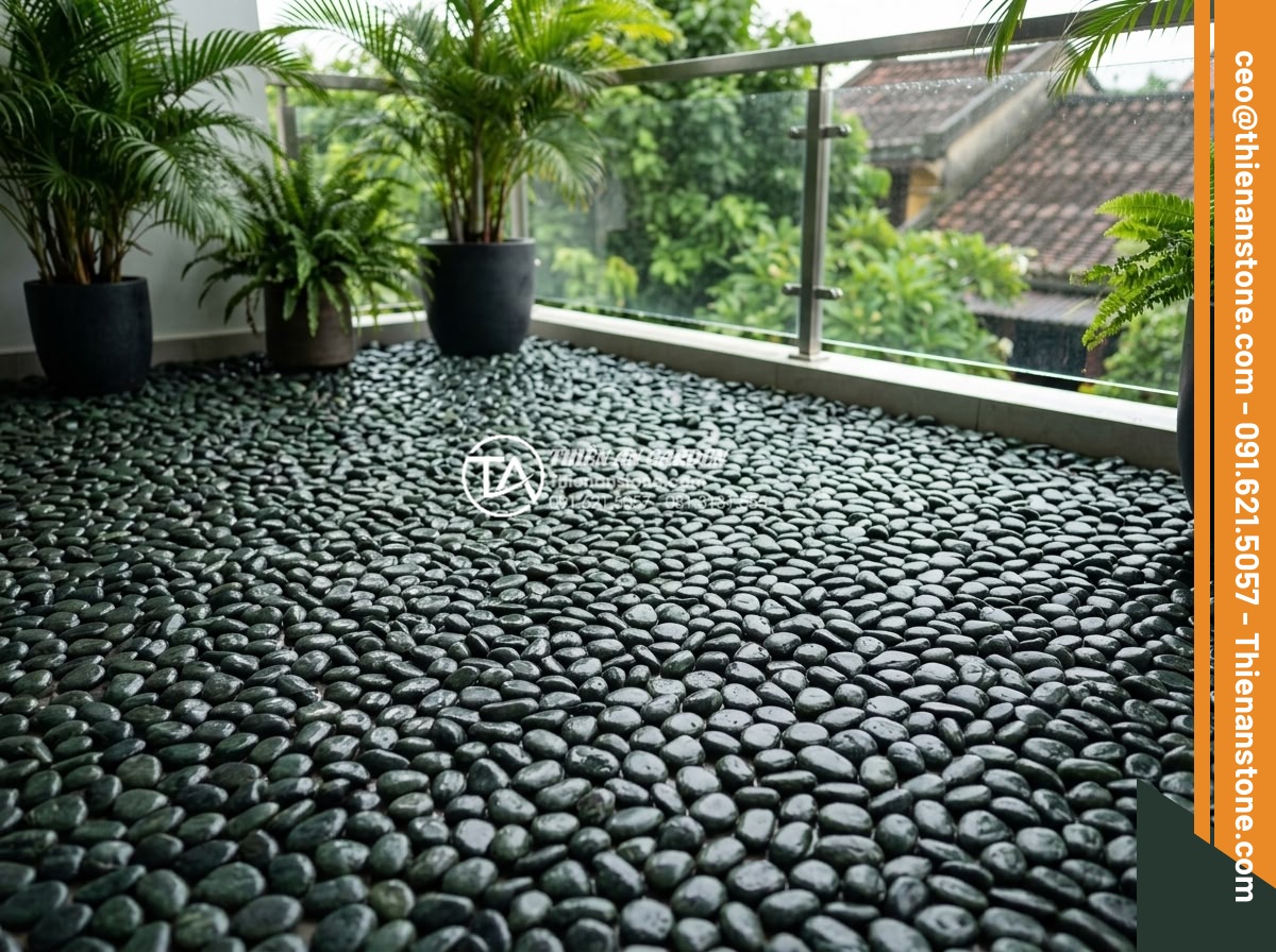Kinh Nghiệm Chọn Gạch Sỏi Lát Sân Chống Thấm Cho Ban Công - Hình 1 Kinh Nghiệm Chọn Gạch Sỏi Lát Sân Chống Thấm Cho Ban Công - High-resolution photo of a modern balcony floor covered with waterproof pebble t