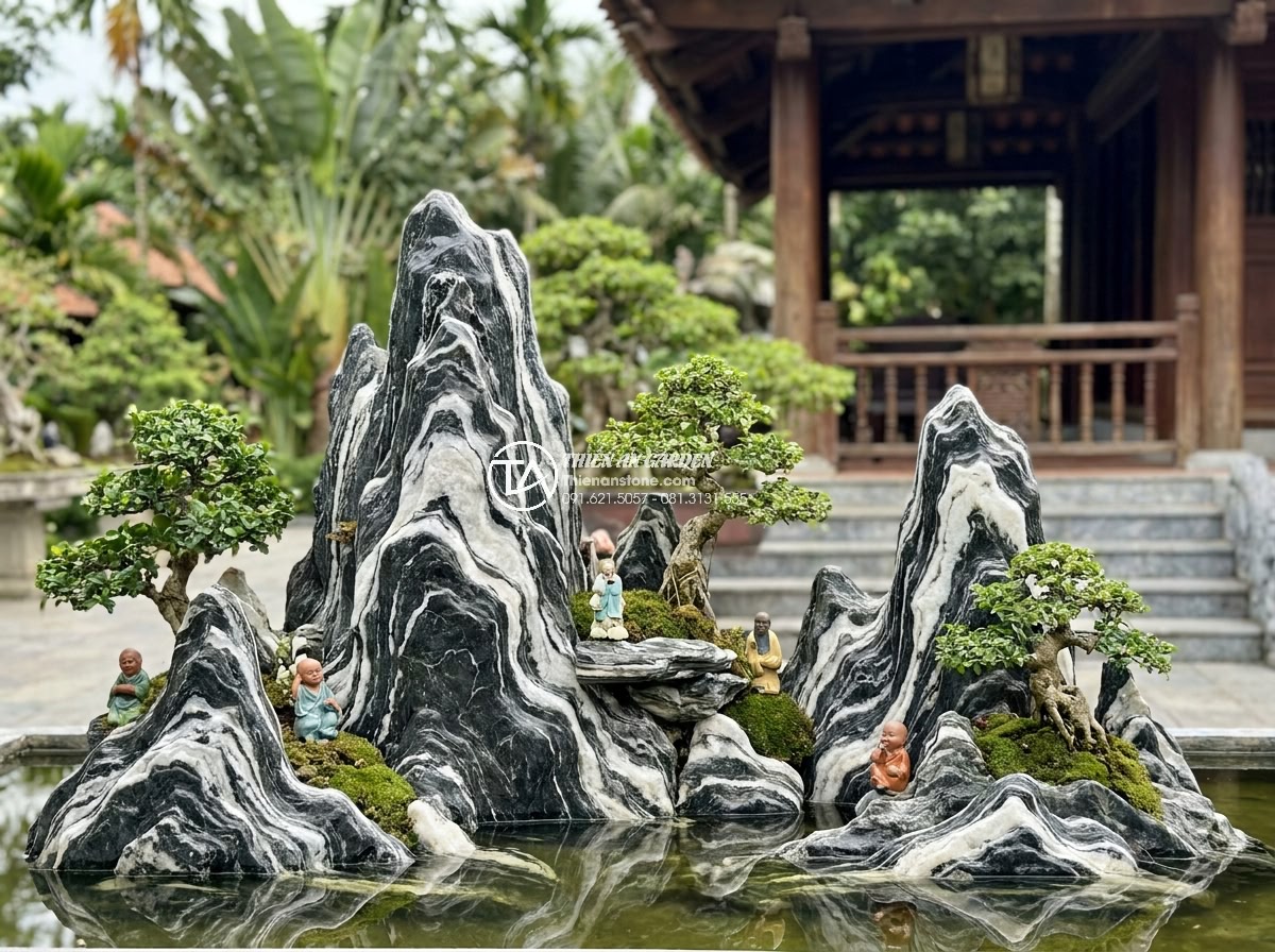 Mua Đá Làm Hòn Non Bộ Ở Đâu Rẻ? Kinh Nghiệm Chọn Đá Chất Lượng - Luxury resort hòn non bộ example with intricate stone arrangements and lighting