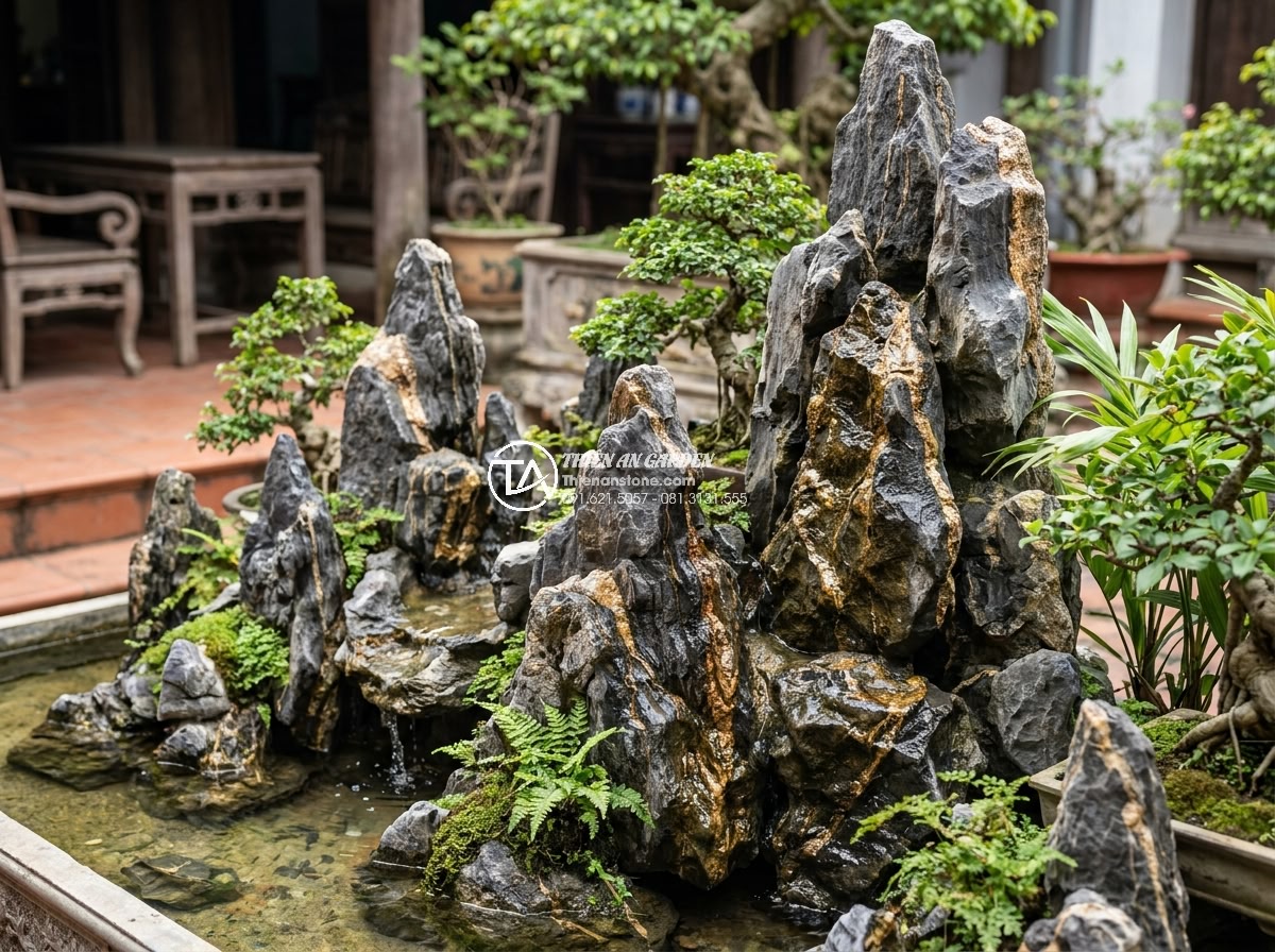 Mua Đá Làm Hòn Non Bộ Ở Đâu Rẻ? Kinh Nghiệm Chọn Đá Chất Lượng - Elegant hòn non bộ constructed with premium natural rocks showing integration wi