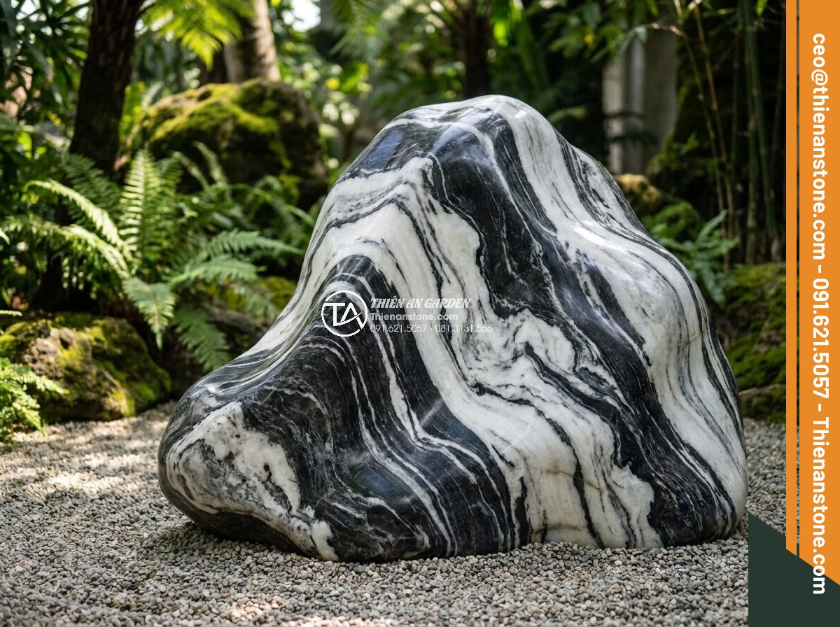 Quy Trình Chế Tác Đá Non Bộ Nguyên Khối Tại Xưởng Điêu Khắc - Polished and treated monolithic stone non-bo ready for garden installation.
