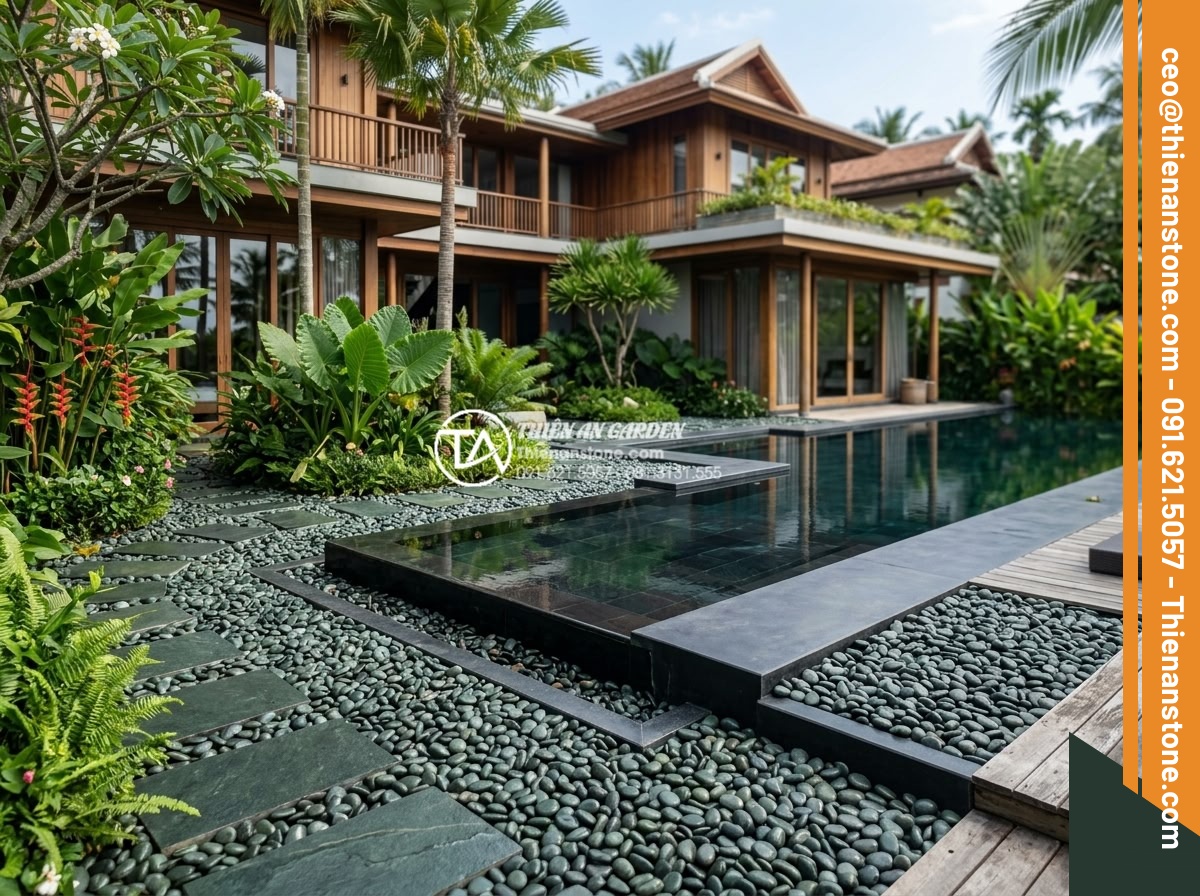 Quy Trình Thi Công Sân Vườn Rải Sỏi Trọn Gói Từ A-Z - Hình 17 Quy Trình Thi Công Sân Vườn Rải Sỏi Trọn Gói Từ A-Z - Luxurious villa garden with pebble landscaping integrated with modern architectu