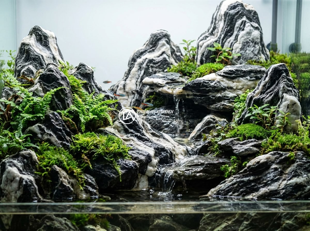 Thiết Kế Đá Non Bộ Bể Cá Cảnh: Bí Quyết Tạo Hệ Sinh Thái Tự Nhiên - Close-up view of a traditional Vietnamese stone non-bo rockery integrated into a