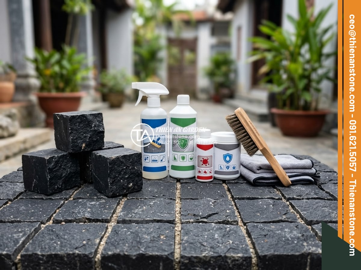 Cách vệ sinh và bảo dưỡng đá cubic lát sân luôn như mới - Collection of professional stone cleaning and sealing products arranged on cubic