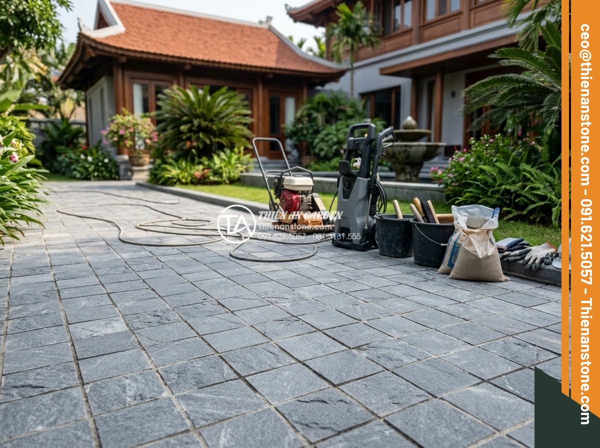 Cách vệ sinh và bảo dưỡng đá cubic lát sân luôn như mới - Professional team from stone company performing expert maintenance on cubic pave
