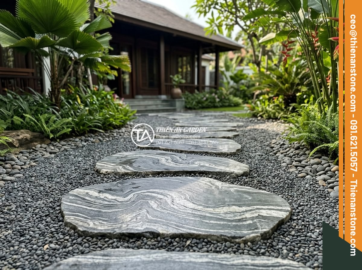 Cách vệ sinh và bảo dưỡng đá dặm bước sân vườn không bị rêu mốc - Professional team from stone company installing and maintaining high-quality ste