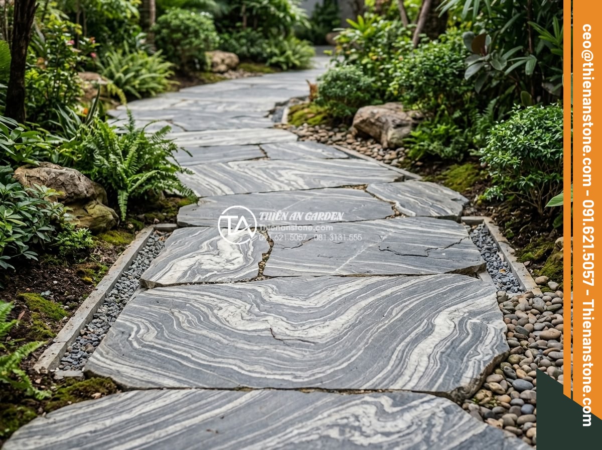 Đá bước dạo tự nhiên: Tại sao là lựa chọn số 1 cho cảnh quan bền vững? - Completed professional installation of natural stone pathway with proper drainag