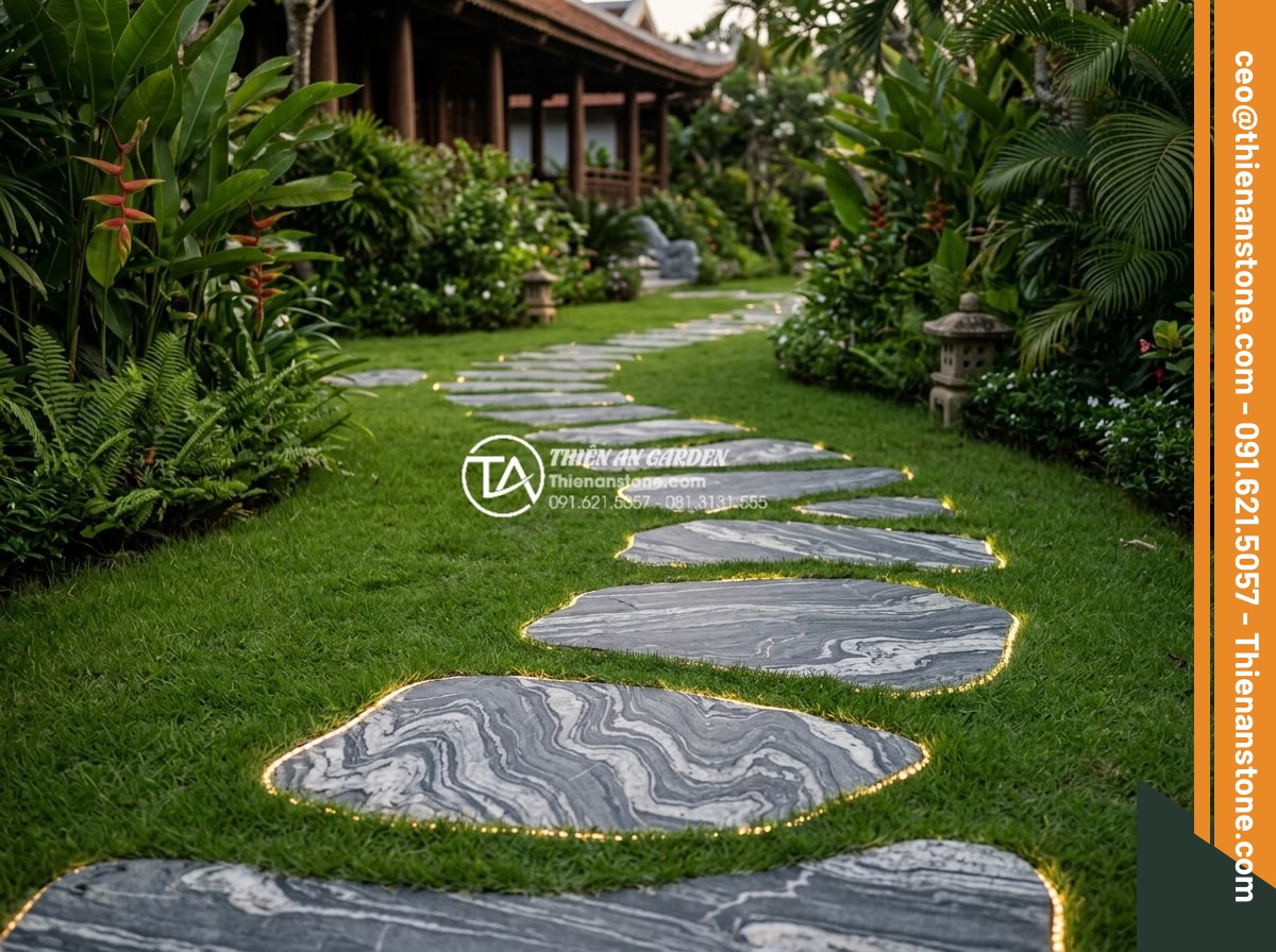 FAQ: Những câu hỏi thường gặp nhất khi chọn mua đá dặm bước - Creative arrangement of irregularly shaped stepping stones integrated with grass