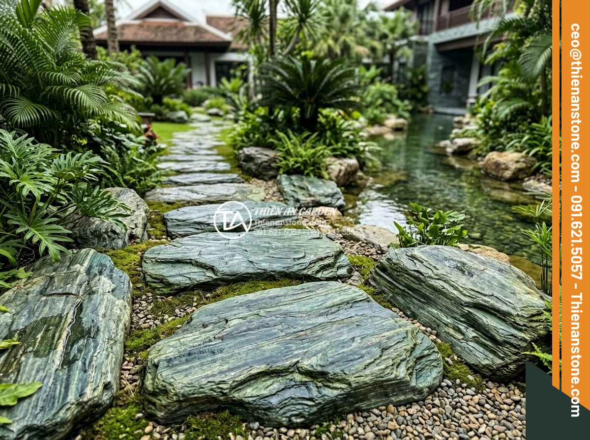 Review 5 loại đá bước dạo bán chạy nhất đầu năm 2026 - Detailed granite stepping stone installation in luxury resort garden, showing te