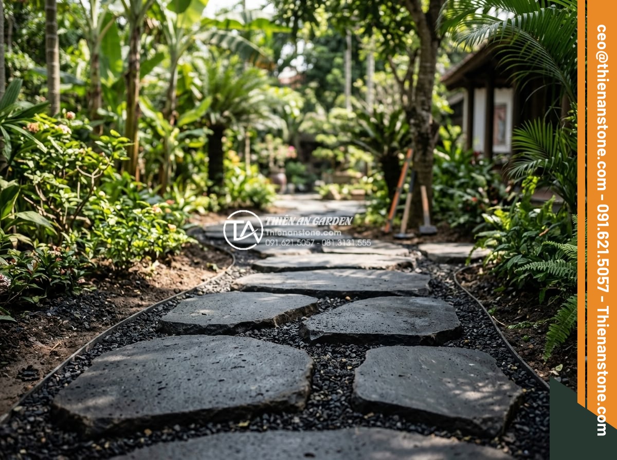 So sánh đá dặm bước bazan và đá slate: Nên chọn loại nào cho lối đi? - Happy homeowner standing on newly installed stepping stone path with professiona