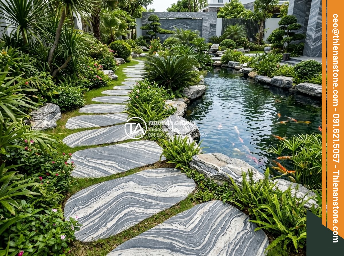Sự khác biệt giữa đá bước dạo cắt quy cách và đá tự nhiên tự do - Wide angle view of a luxurious modern garden with stepping stone paths leading t