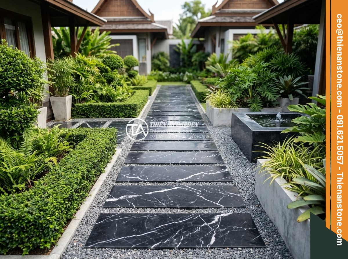 Sự khác biệt giữa đá bước dạo cắt quy cách và đá tự nhiên tự do - Modern garden pathway constructed with perfectly aligned cut stepping stones sur